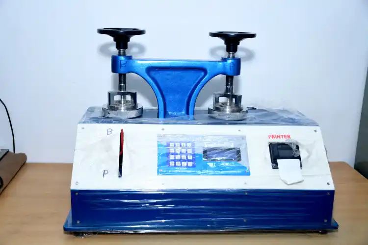 PAPER AND SHEET BURSTING STRENGTH TESTER